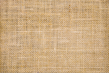 Wall Mural - Rough hessian background with flecks of varying colors of beige and brown. with copy space. office desk concept, Hessian sackcloth burlap woven texture background.