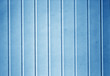 Plastic siding surface in navy blue tone.