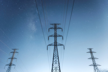 Wall Mural - high voltage electricity pylon at night.