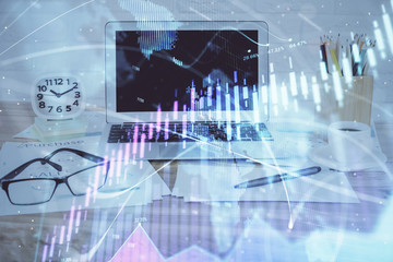 Forex Chart hologram on table with computer background. Double exposure. Concept of financial markets.