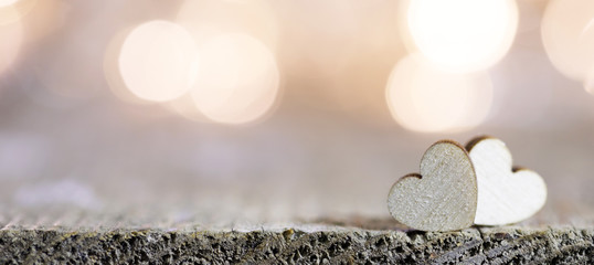 Two hearts on bokeh background