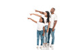 © LIGHTFIELD STUDIOS - african american mother, father and daughter pointing with fingers and looking away on white background
