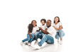 © LIGHTFIELD STUDIOS - happy african american family smiling at camera while sitting on white background