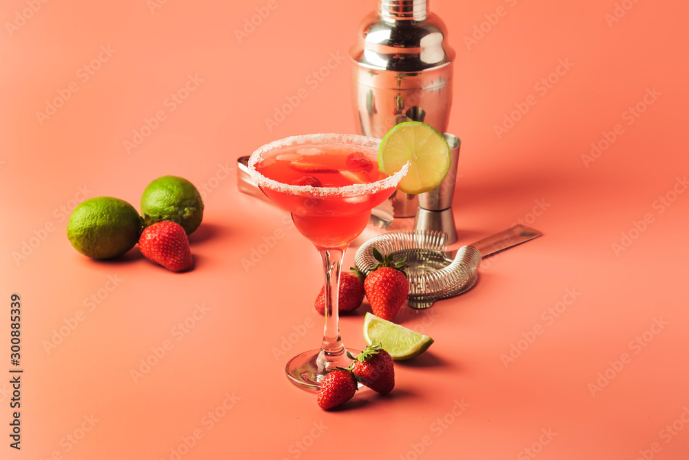 Strawberry red margarita alcoholic cocktail with tequila, liqueur, berries, lime juice, sugar and ice, pink background, copy space - obrazy, fototapety, plakaty 