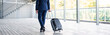 © LIGHTFIELD STUDIOS - panoramic shot of businessman in formal wear holding suitcase