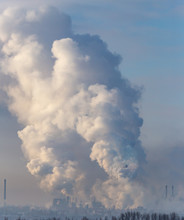 Smoke From The Chimneys Of A Metallurgical Plant At Dawn