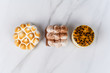 © Mego-studio - Mini chocolate, lemon pie and passion fruit cake.