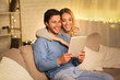 © Prostock-studio - Happy couple having video-call on tablet, free space