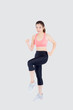 © NT_studio - Beautiful young asian woman happy and smiling jogging isolated on white background, asia girl cheerful in sport is activity exercise cardio and workout with running for healthy, health concept.