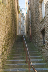 Poster - long stone stairs and historic Norman stone houses in the Saint-Malo Intra-Muros Neighboorhood