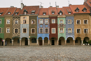 Poster - cobbled market and facades of historic tenement houses in Poznan..