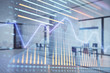 © Andrey - Stock and bond market graph with trading desk bank office interior on background. Multi exposure. Concept of financial analysis