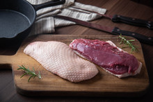 Raw Duck Breast Meat On Cutting Board