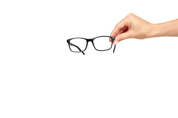 Poster - Hand with black eyeglasses, eye optic correction tool.