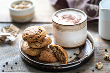 Homemade Cookies With Nuts And Coffee In A Ceramic Cup