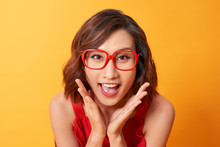 Image Of Screaming Excited Young Cute Woman Posing Isolated Over Yellow Background.