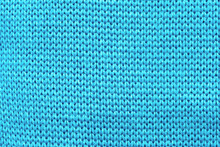 Blue Knitted Fabric Texture Background. Top View.