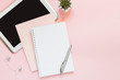 Blank notebook for writing on spirals on a pink background, flat lay, the end of motivation, business, building goals with negative industrial space and copy space