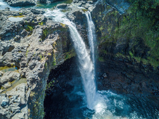 Wall Mural - Aerial drone shot view of rainbow fall on big island national park in Hawaii 