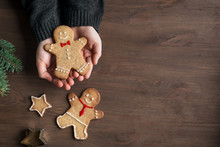 Hands Holding Christmas Gingerbread
