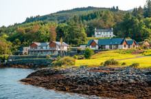 Cottages Facing Loch Linnhe In Corran, A Former Fishing Village, Situated On Corran Point, On The West Side Of The Corran Narrows Of Loch Linnhe, In Lochaber, In The Scottish Highlands