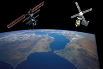 Wall Mural - Space station. Different spaceships above the earth. The elements of this image furnished by NASA.