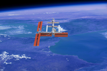 Wall Mural - space craft or satellite above earth. the elements of this image furnished by nasa.