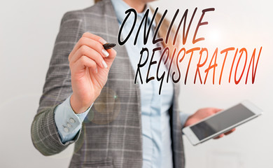 Leinwandbilder - Handwriting text writing Online Registration. Conceptual photo System for subscribing or registering via the Internet Business woman pointing in empty space with pen and mobile phone