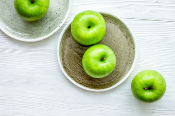 fresh organic green fruits with apples on white background top view