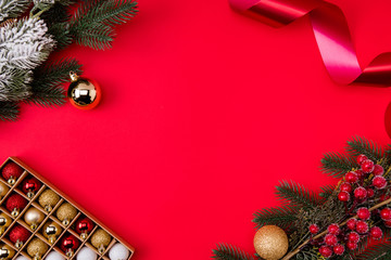 Wall Mural - Top above high angle view photo of empty space with toys branches of fir tree toys tinsel surrounding isolated red color vivid background