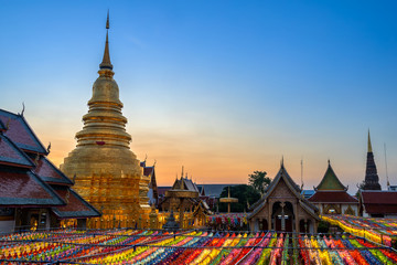 The light of the Beautiful Lanna lamp lantern are northern thai style lanterns in Loi Krathong or Yi Peng Festival at Wat Phra That Hariphunchai is a Buddhist temple in Lamphun, Thailand.