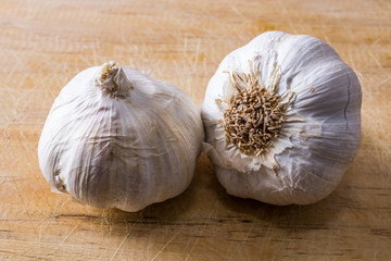 Wall Mural - natural garlic on wooden background