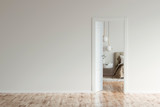 Empty room with an open door to a beige modern bedroom. 3d illustration