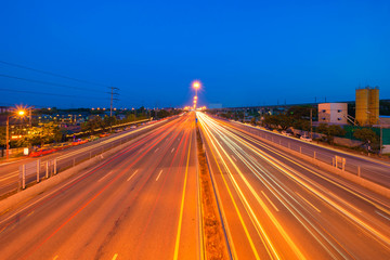 Aufkleber - Car light trails on highway street or road in Bangkok, Thailand. Urban city at night in transportation, business, or technology concept. Wallpaper fast motion speed background. Long exposure.