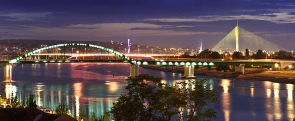 Panorama view of Belgrade, Serbia while sunset, it's main river Sava and all bridges connecting two banks of the town