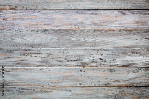 Photo Gray wooden background with old painted boards