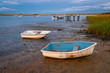 Dinghies beached at low tide