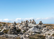 Cairns From Stones. The Pyramids That Tourists Made Of Stones In The Mountains. Seven Rila Lakes, Bulgaria