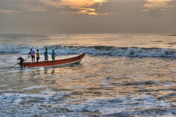 fishing boat leaving to fish early in the morning in Mamallapuram near Chennai, India