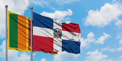 Sri Lanka and Dominican Republic flag waving in the wind against white cloudy blue sky together. Diplomacy concept, international relations.