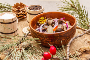 Wall Mural - Pickled (fermented) mushrooms. Traditional New Year (Christmas) snack. Festive table cutlery setting