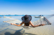 © siraphol - Portrait beautiful young asian woman sitting on hammock around sea beach ocean for relax