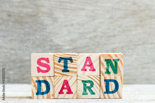 Cuadros en Lienzo Letter block in word standard on wood background