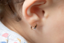 The Puncture Of Ears To Children Is Younger Than Three Years