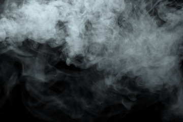 Wall Mural - Abstract powder or smoke isolated on black background