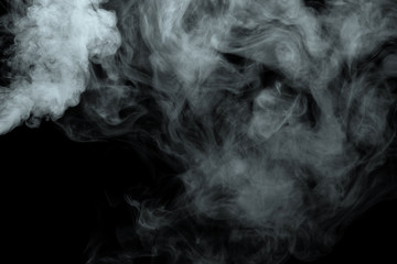 Wall Mural - Abstract powder or smoke isolated on black background