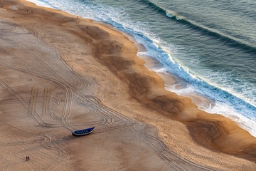 Wall Mural - Evening time by Atlantic ocean in Nazare, Portugal.