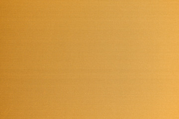 Wall Mural - Cotton silk fabric wallpaper texture pattern background in yellow orange copper gold brass brown color tone