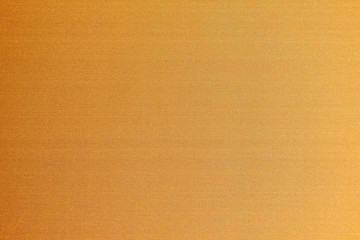 Wall Mural - Cotton silk fabric wallpaper texture pattern background in yellow orange copper gold brass brown color tone