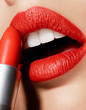 Woman's Sensual Red Lips With Red Lipstick